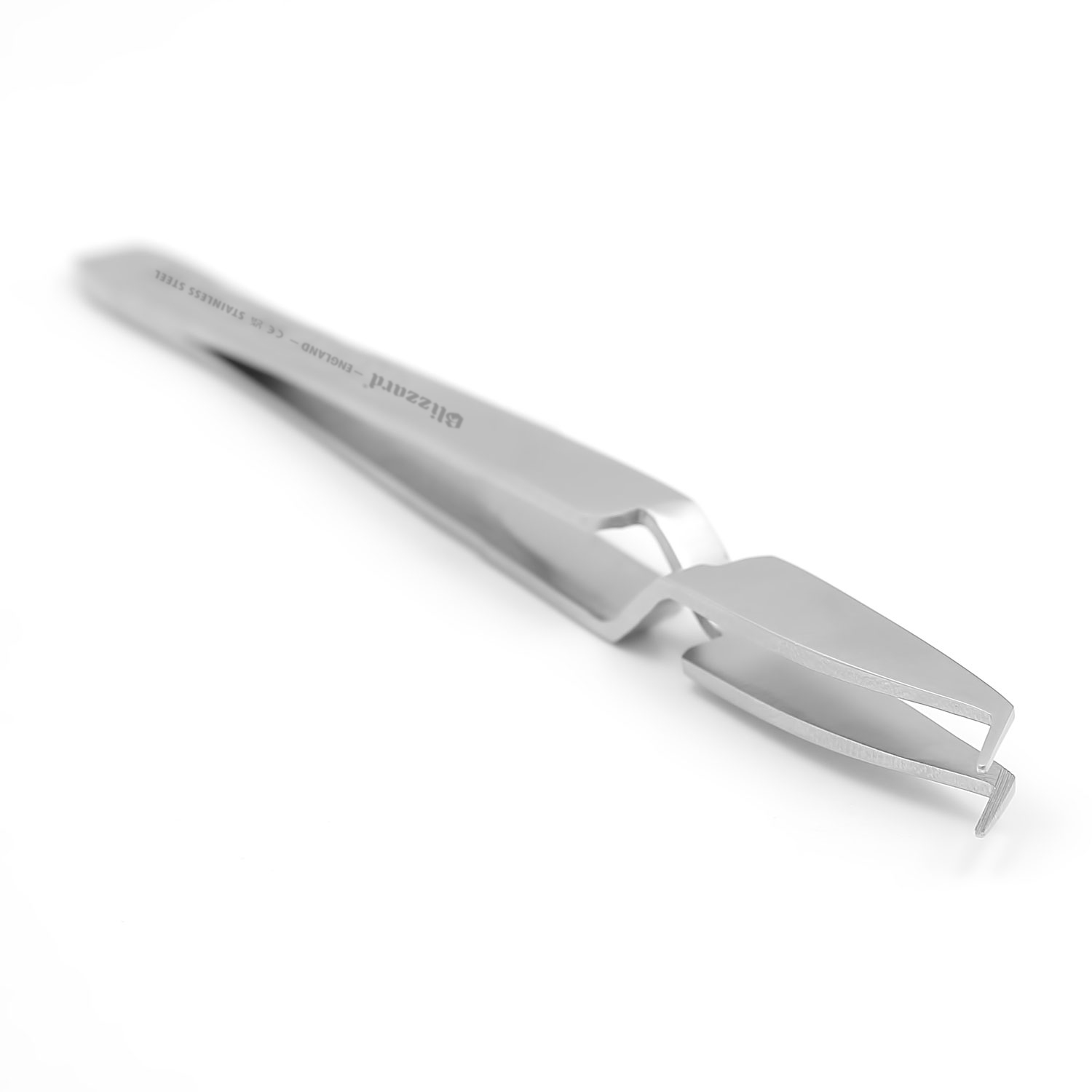 Angled stainless steel dental instrument with a narrow, hooked tip on a white background.